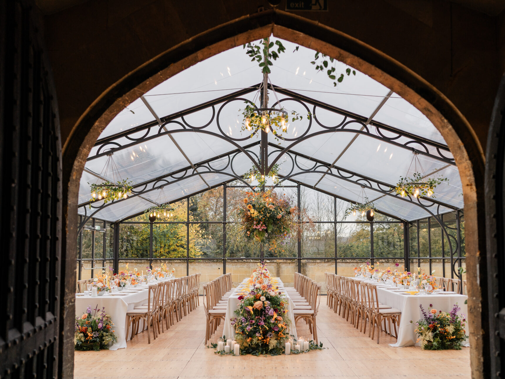 An ancient doorway seamlessly links the Orangery with the Castle Coach House