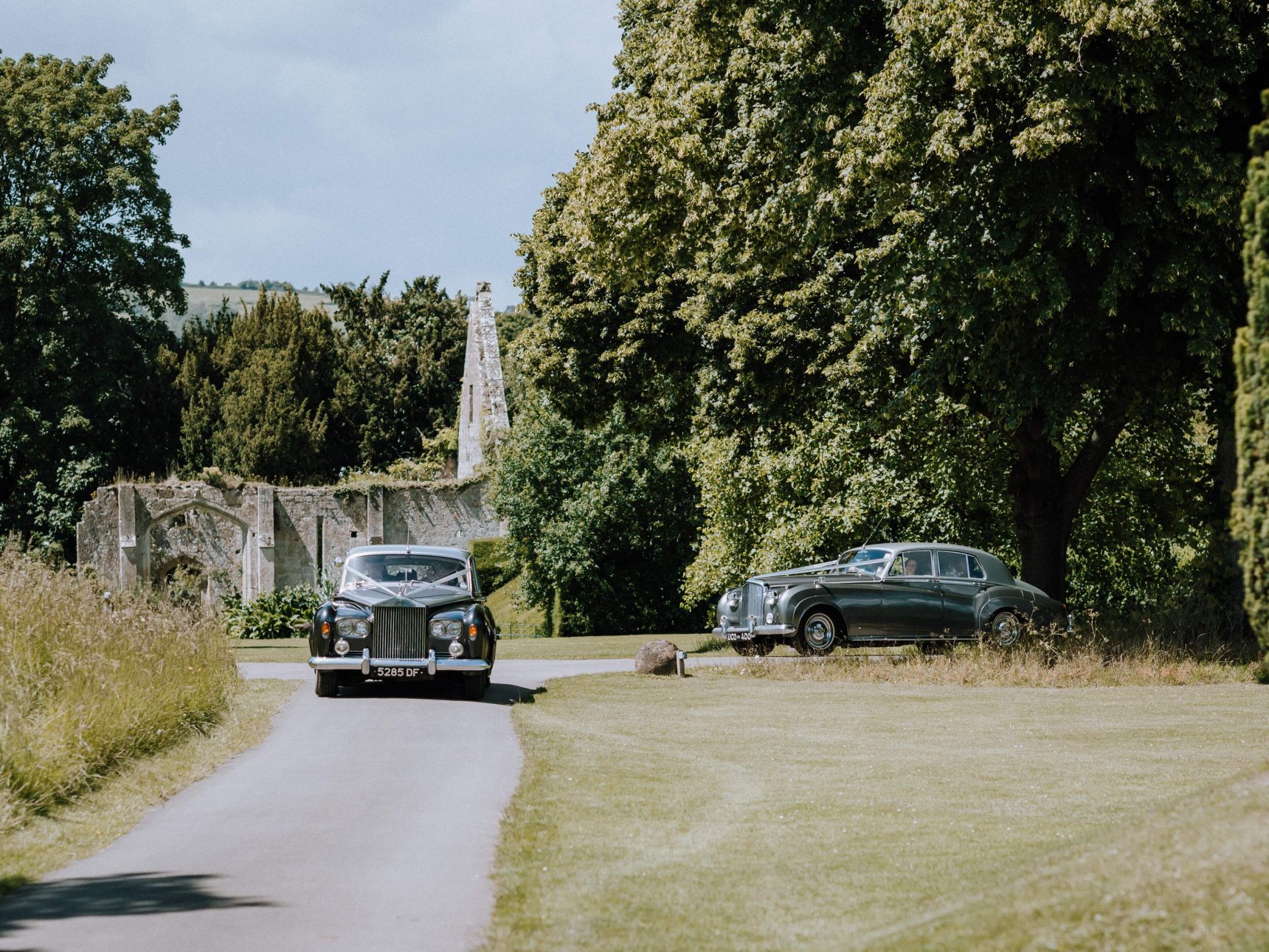 Sweep up the castle's tree lined driveway